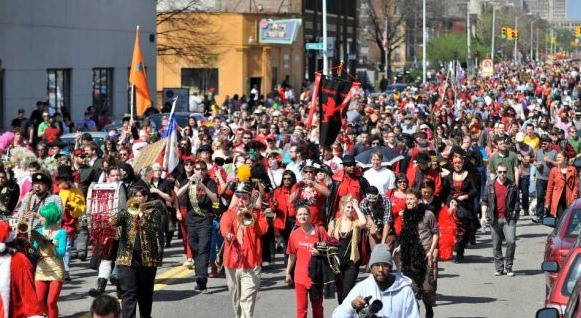 Banishing an Ancient Curse from Detroit with a Parade, Costumes, and a Lot of Red